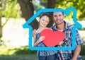 Father and daughter holding a heart shape