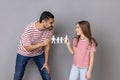 Father and daughter holding paper people chain, family relationship, childhood and parenthood. Royalty Free Stock Photo