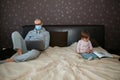 Father and daughter in a home quarantine