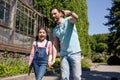 Father with daughter with laptop in park Royalty Free Stock Photo