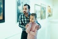 Father and daughter looking at expositions Royalty Free Stock Photo