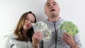 father and daughter a lot of money in their hands joy success dollars euro 100 dollar bill wave money like a fan look Royalty Free Stock Photo