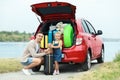 Father and daughter near car trunk with suitcases Royalty Free Stock Photo