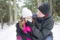 Father and daughter outdoor in the winter forest Royalty Free Stock Photo