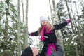 Father and daughter outdoor in the winter forest Royalty Free Stock Photo