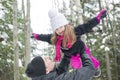 Father and daughter outdoor in the winter forest Royalty Free Stock Photo