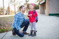 Father and daughter outside of school Royalty Free Stock Photo