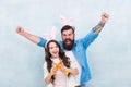 Funny team. Spring holiday. Celebrate easter. Easter food. Girl and dad bunny ears. Happy family wear bunny ears. Easter Royalty Free Stock Photo