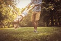 Father and daughter playing in meadow. Royalty Free Stock Photo