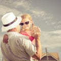 Father and daughter playing near a house