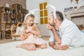 Father and daughter playing with rabbit Royalty Free Stock Photo