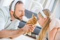 Father and daughter playing with rabbit Royalty Free Stock Photo