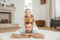 Father and daughter playing with rabbit Royalty Free Stock Photo