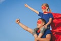 Father and daughter playing superhero at the day time. Royalty Free Stock Photo