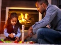 Father and daughter playing together