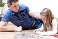 Father daughter puzzle Royalty Free Stock Photo