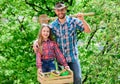 Father and daughter on ranch. little girl and happy man dad. earth day. new life. spring village country. ecology Royalty Free Stock Photo