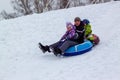 Father and daughter riding a roller coaster in the winter Royalty Free Stock Photo