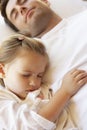 Father And Daughter Sleeping In Bed Royalty Free Stock Photo