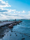 Father and daughter smiling walking running on empty beach. Lifestyle photo real people. Happy active family having fun Royalty Free Stock Photo