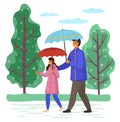 Father and daughter spend time together on a rainy october day move down the street past tall trees Royalty Free Stock Photo