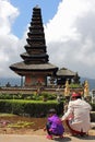 Father and daughter at the temple