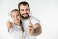 Father and daughter with toothbrushes Royalty Free Stock Photo