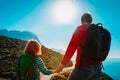 Father and daughter travel in nature, family hiking in mountains Royalty Free Stock Photo