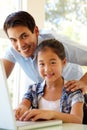 Father and daughter using laptop Royalty Free Stock Photo