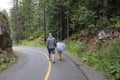 Father and daughter walk in the rain Royalty Free Stock Photo