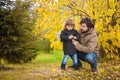 Father and daughter walking together, autumn day. Royalty Free Stock Photo