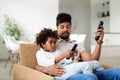 Father And Daughter Watching Television Royalty Free Stock Photo