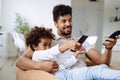 Father And Daughter Watching Television Royalty Free Stock Photo