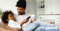 Father And Daughter Watching Television at home Royalty Free Stock Photo