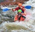 Father and Daughter whitewater kayaking