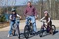 Father and Daughters Bike Riders Royalty Free Stock Photo