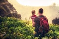 Father embracing daughter during exploring mountains as family travelling lifestyle