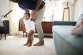 Father Encouraging Baby Daughter To Take First Steps At Home Royalty Free Stock Photo