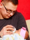 Father feeding newborn baby girl with milk bottle Royalty Free Stock Photo