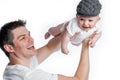 Father Flying Baby with Flat Cap