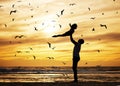 Father, flying child and beach silhouette of seaside travel holiday with birds in sunset background. Strong dad, happy