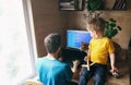 Father freelancer try work from home office, son child and cat hinder him, self- lifestyle workspace workplace