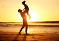 Father, girl and beach at sunset happy, silhouette of man and child together play on sand. Parent, ocean and sun, rising Royalty Free Stock Photo