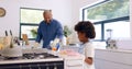 Father, girl and cleaning with gloves in kitchen for bonding, happiness and teaching in home or house. Black family, man Royalty Free Stock Photo