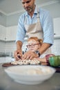 Father, girl in kitchen and cooking food together for healthy, organic family lunch and cutting vegetables at home. Dad Royalty Free Stock Photo