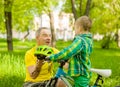 Father gives his son a bicycle helmet