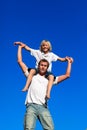 Father giving his son a piggyback ride Royalty Free Stock Photo