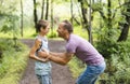 Father giving his son a piggyback ride, having fun Royalty Free Stock Photo