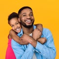 Father giving piggyback ride to his daughter Royalty Free Stock Photo