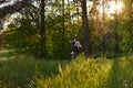 Father giving piggyback ride to small daughter on a walk in forest Royalty Free Stock Photo